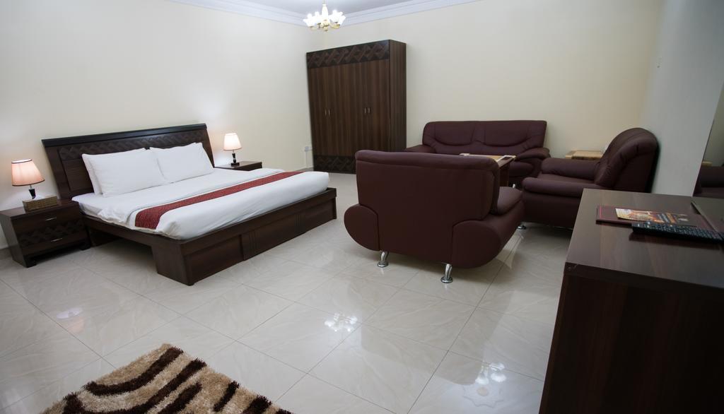 Tiger Home Hotel Apartments Muskat Eksteriør bilde