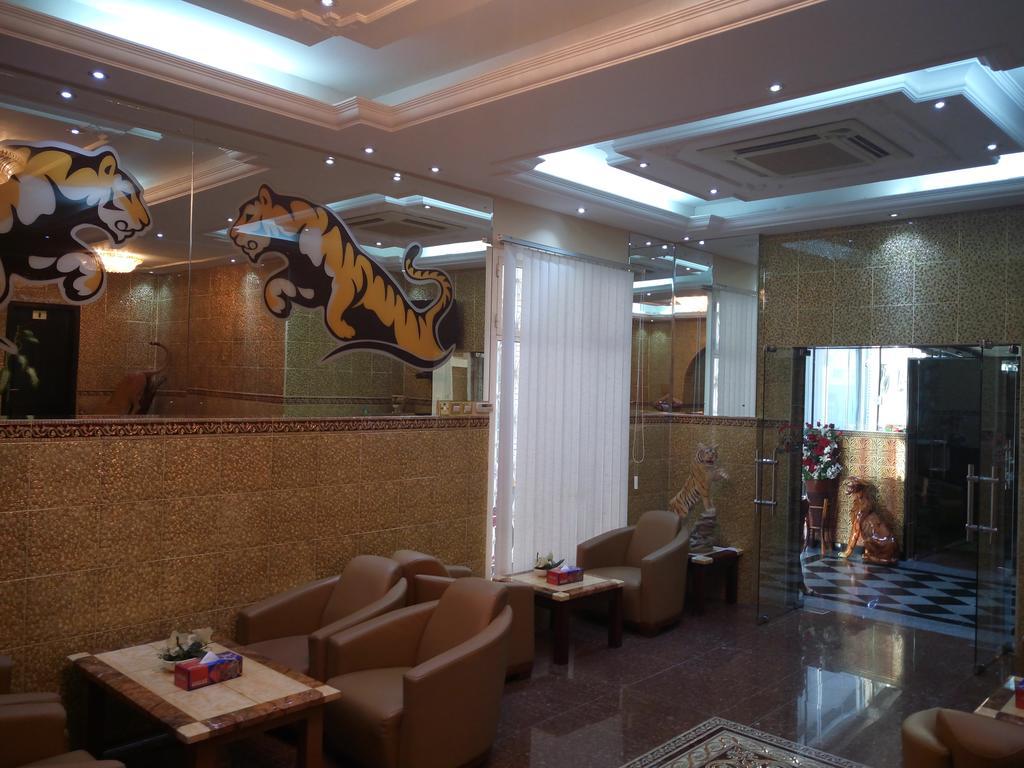 Tiger Home Hotel Apartments Muskat Eksteriør bilde