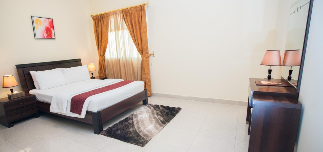 Tiger Home Hotel Apartments Muskat Eksteriør bilde