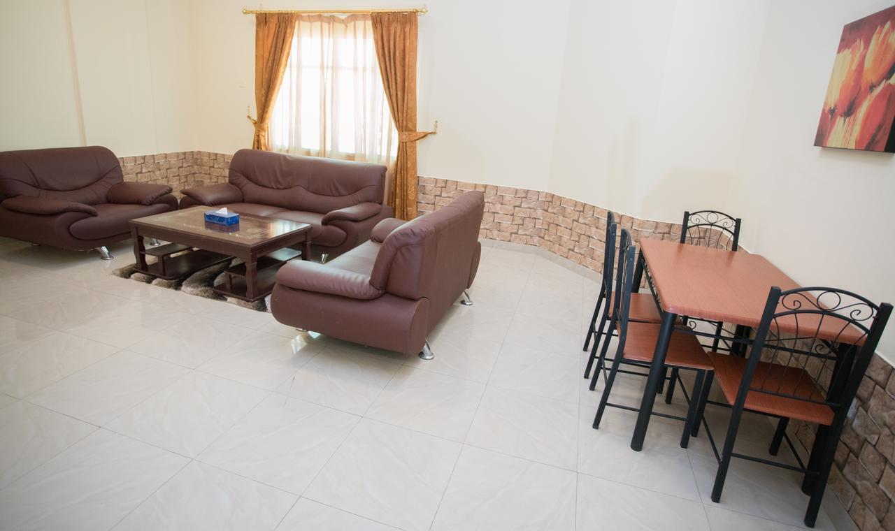 Tiger Home Hotel Apartments Muskat Eksteriør bilde