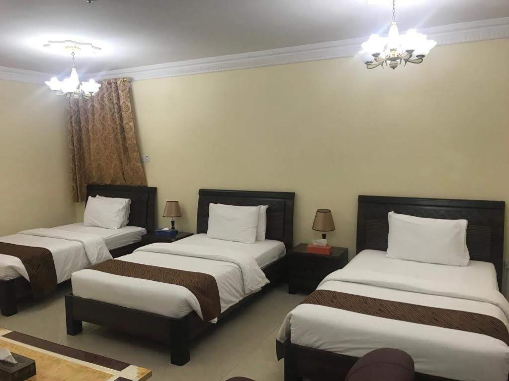 Tiger Home Hotel Apartments Muskat Eksteriør bilde