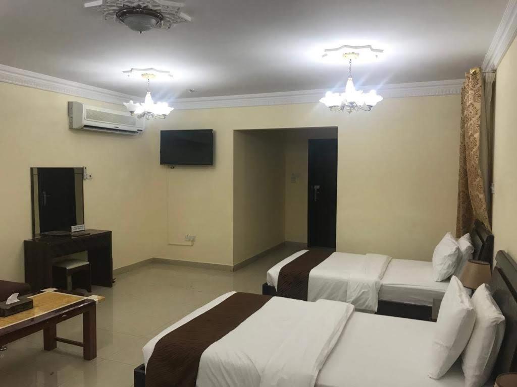Tiger Home Hotel Apartments Muskat Eksteriør bilde