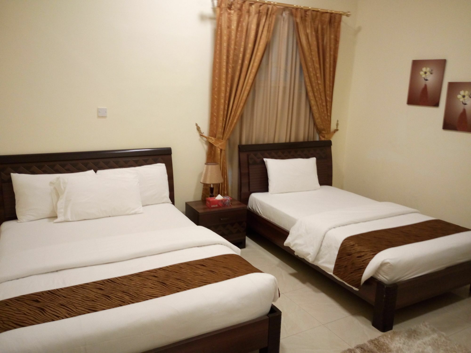 Tiger Home Hotel Apartments Muskat Eksteriør bilde